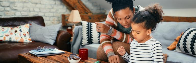 Foster carer teaching foster child