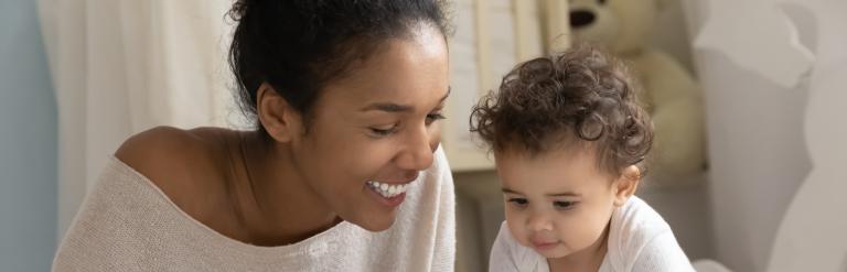 Foster carer with a child in a spare bedroom